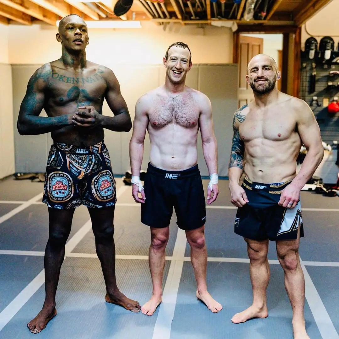 Imagem da notícia: Mark Zuckerberg posta foto em treino com campeões do UFC para possível luta com Elon Musk