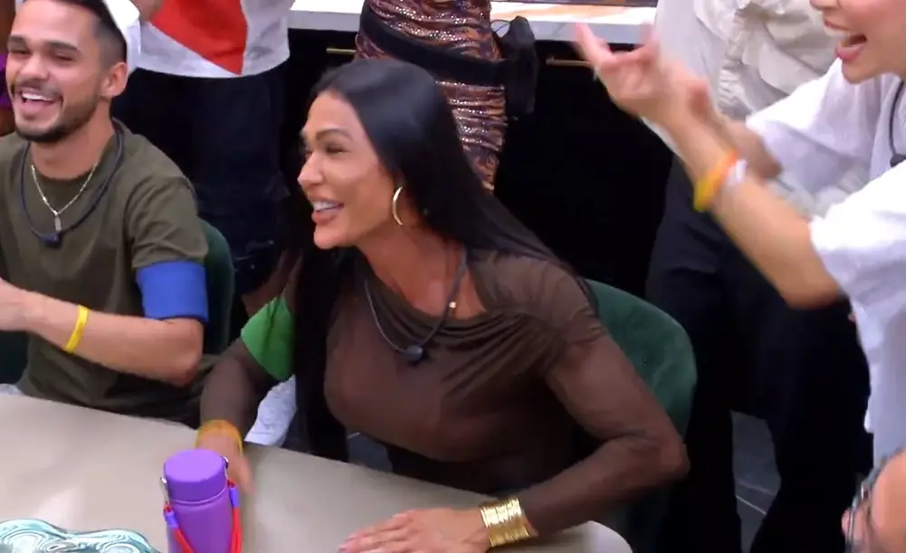 Imagem da notícia: Belo reage após Gracyanne Barbosa cantar hit 'Derê' com participantes do BBB 25; veja