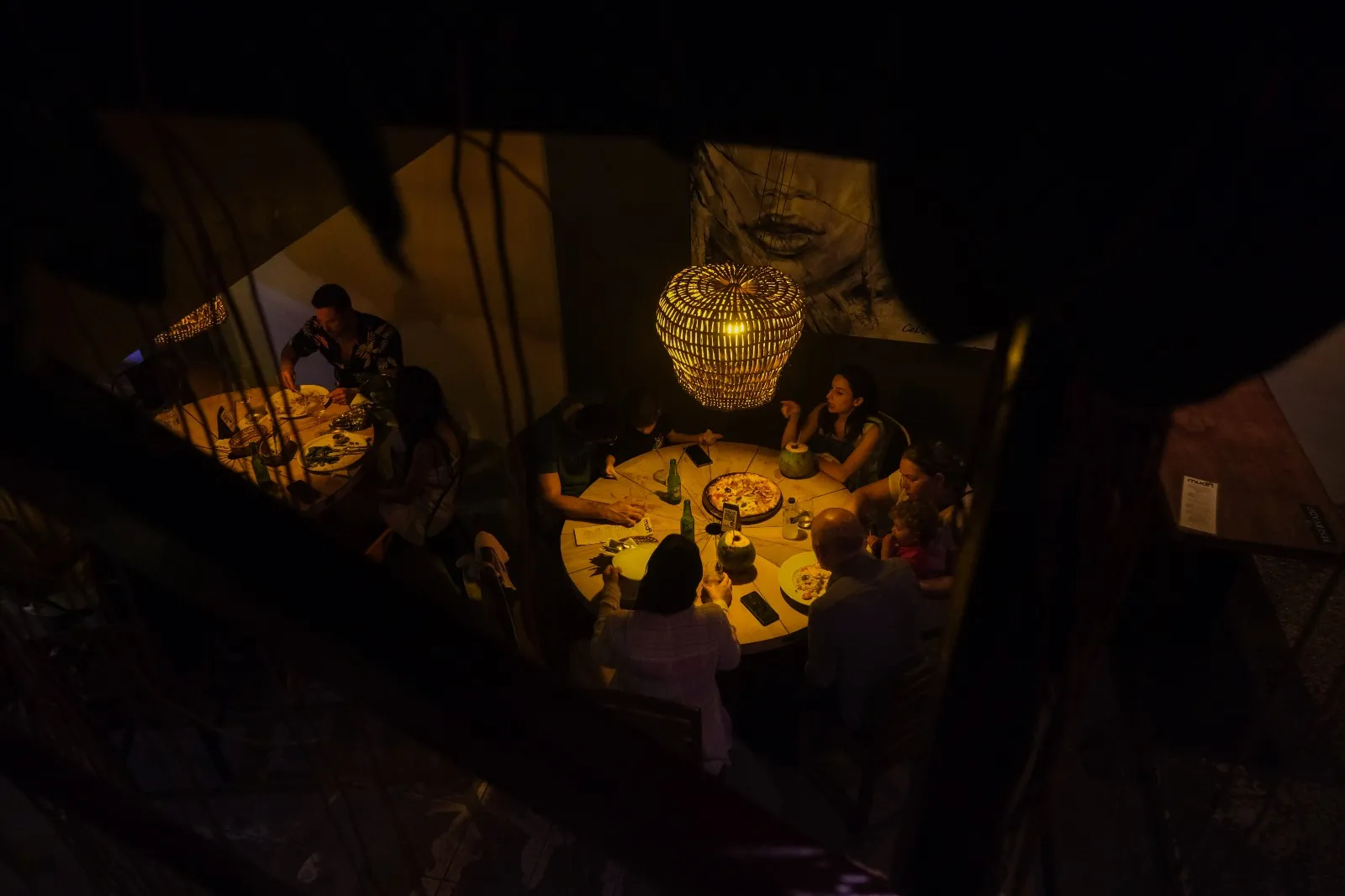O aconchegante ambiente do Muda é ideal para reunir a família e comer uma pizza, por exemplo