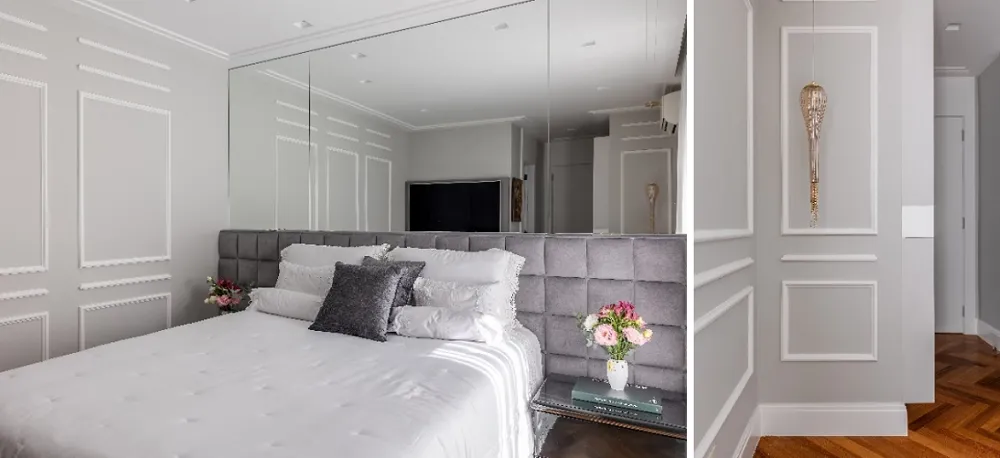 Para um ar clássico, os boiseries brancos em destaque na parede cinza decoram quarto de casal; projeto Cristiane Schiavoni